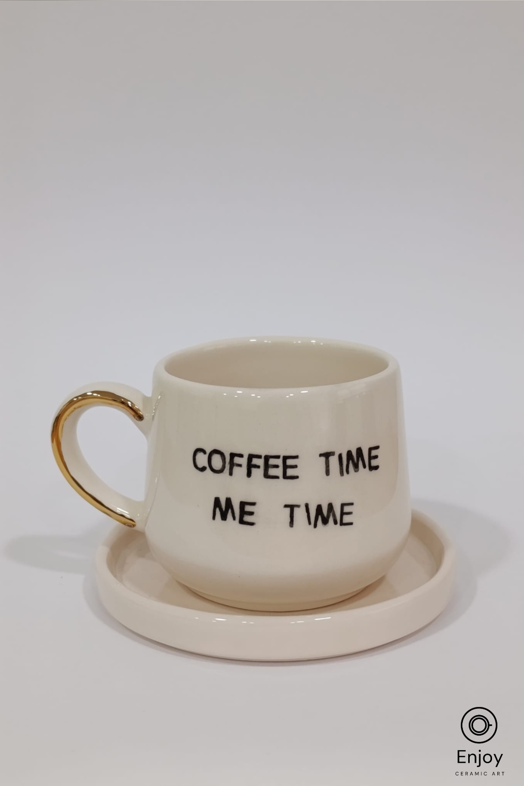 Ceramic mug with 'COFFEE TIME ME TIME' text on a matching coaster, on a white background.