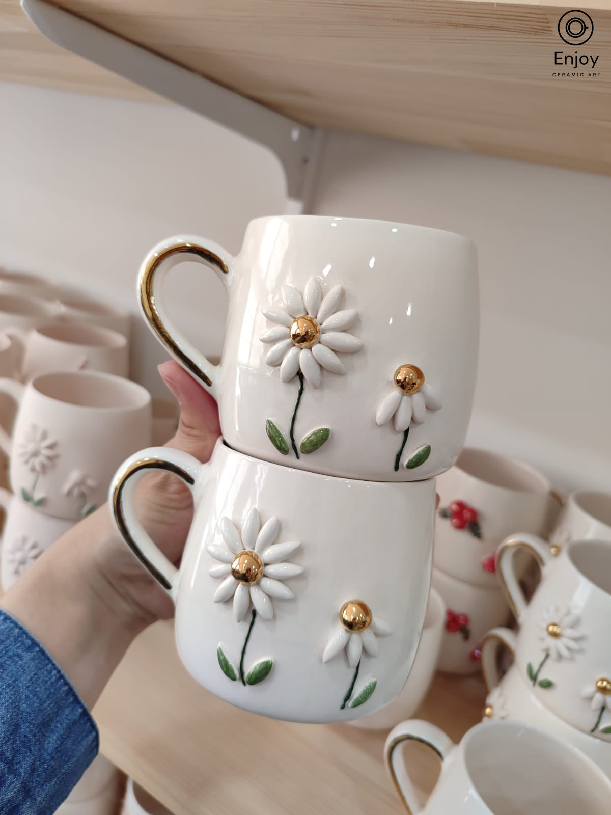 Handmade daisy mug with gold handle and gold center
