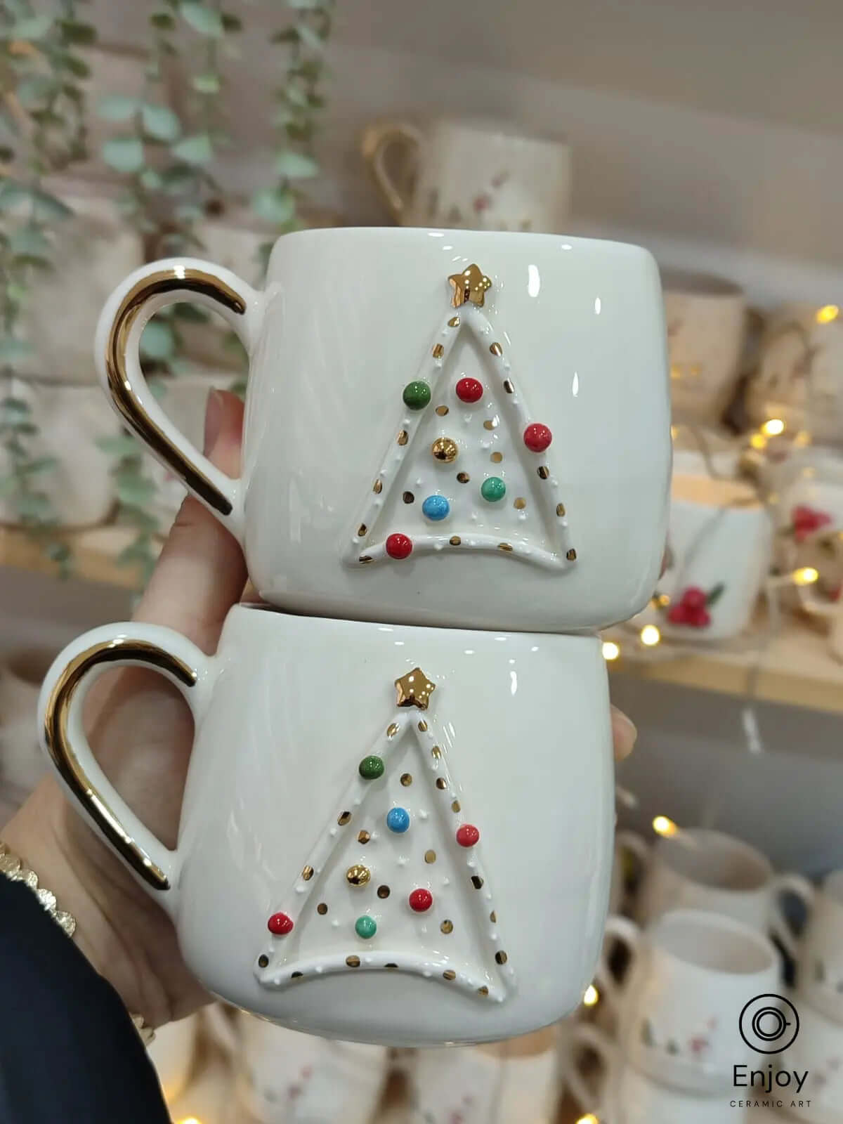 Star Trek-inspired ceramic mug with a festive 3D Christmas tree design, colorful baubles, gold accents, and a 10 oz capacity. Perfect for Trekkies!